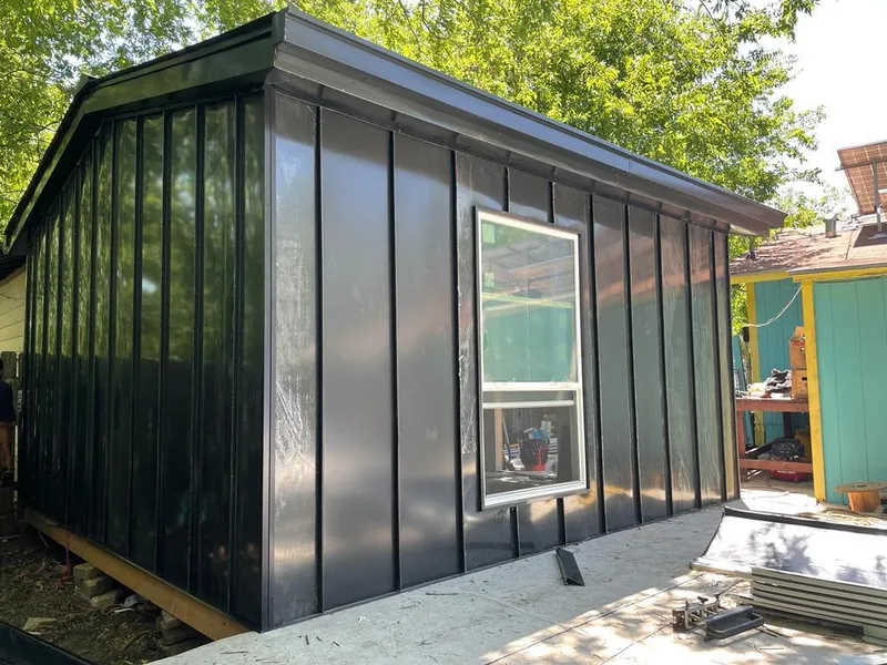 Black standing seam metal wall panels for Roof Inspection in New Britain